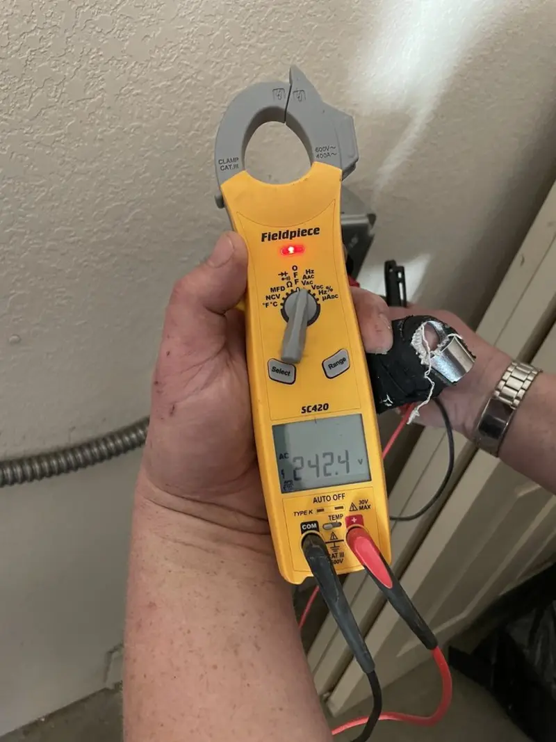 Voltage testing with clamp meter during Circuit Breaker Repair in Clemmons